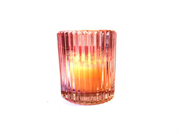 istock Candles on a white background. Scented candle holder. scented candle in glass 1408988941