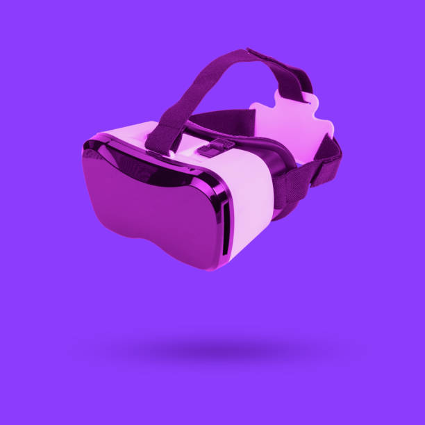 Tinted image of vr glasses on a purple background. A popular virtual reality gadget.