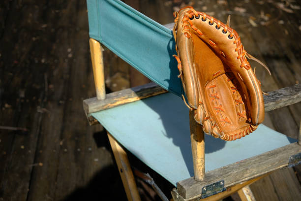 istock Leather Baseball Glove On Old Chair 1409007999