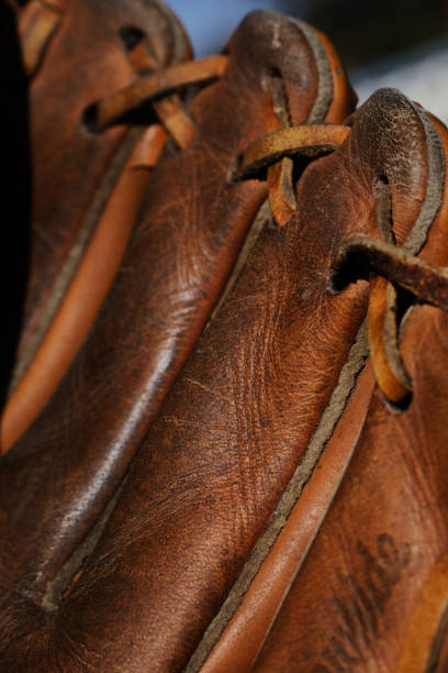 istock Well used leather baseball glove 1409008020