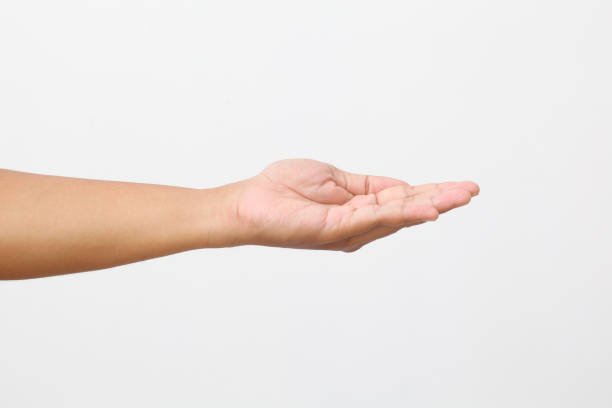 istock Man's hand with palm up. Isolated on white background 1409008071