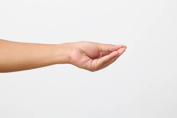 istock Man's hand hold and giving something. Isolated on white background 1409008075