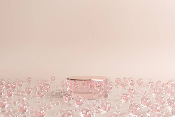 plataforma de vidro rosa stand círculo redondo com bolas de cristal rosa tamanho misturado em água ou líquido creme. anúncio pódio para beleza e cosméticos. - liquid crystal display - fotografias e filmes do acervo