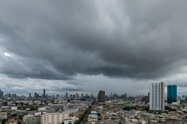 Menacing storm above Bangkok city life background stock photo