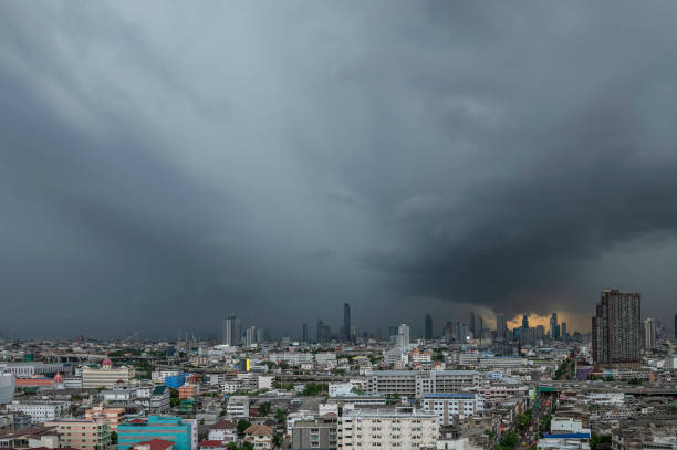 Menacing storm above Bangkok city life background stock photo