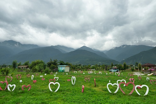 Dali City,Yunnan Provinc,\nThis is the Net Red (Internet celebrity) park in the Cangshan Mountains,It features many elements of modern life and is popular with young people.\nThis is a green meadow full of love.