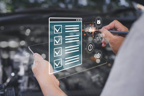 istock Car business concept and technology on virtual screen, Serviceman use tablet check item list of car mileage for maintenance and service with the engine room in the background,Smart work of car service 1409022510
