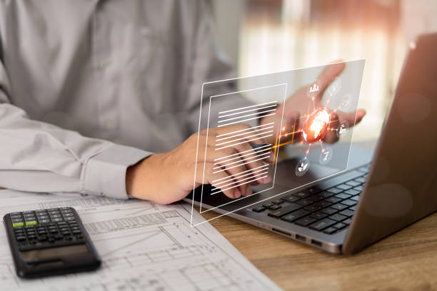 istock Digital marketing online internet,Businessman pointing on virtual screen  use a laptop computer, ideas for work planning efficiency, calculator pen and drawing on wood table 1409023035