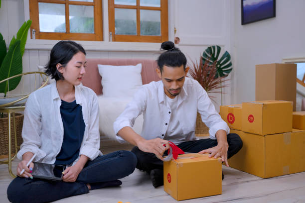 istock Young couple are working together at home. 1409039973