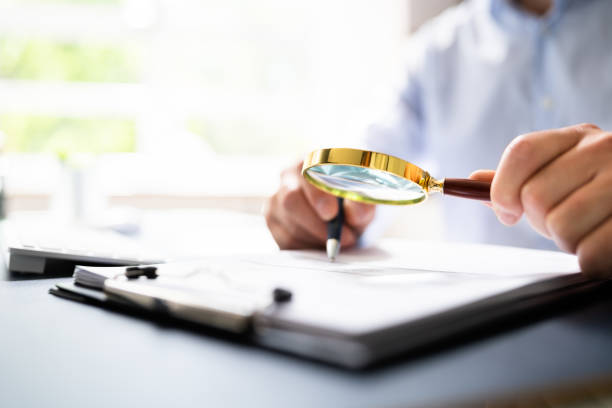 istock Auditor Doing Tax Fraud Investigation 1409041135