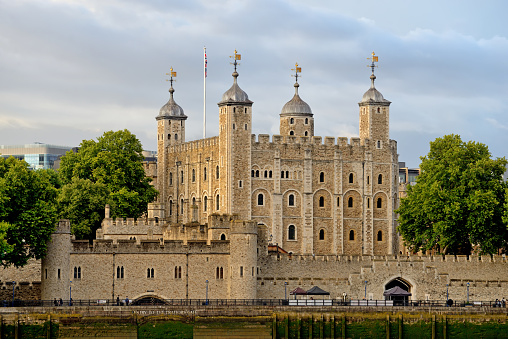London, United Kingdom - May 30, 2023:  People waiting in a row for the entrance to the famous Tower of London.