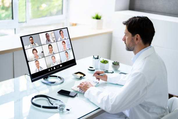 istock Medical Doctor Holding Online Elearning Video 1409041665