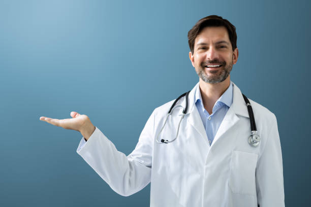 istock Happy Man Doctor In Labcoat Standing 1409041677