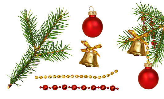 Holiday arrangement and set of red and golden decorations with green twig of Christmas tree isolated on white background