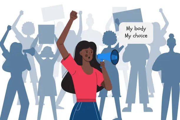 Vector illustration of A dark-skinned girl with a clenched fist holds a megaphone against the silhouettes of protesting women. My body my choice. Protest against abortion ban. Fighting for women's rights.Vector illustration