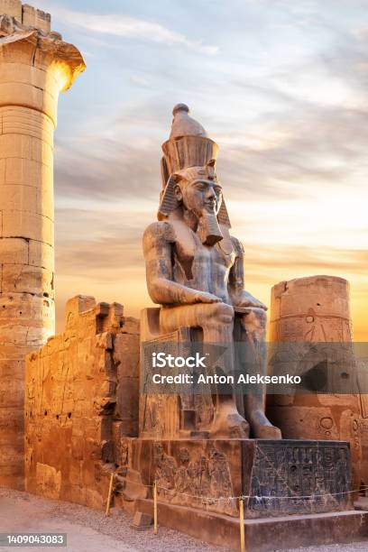Seated Statue Of Ramesses Ii By The Luxor Temple Entrance Sunset Scenery Egypt Stock Photo - Download Image Now