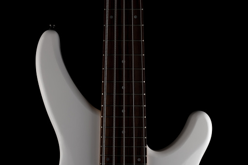 Close-up picture of a white, 5 strings bass guitar with fretboard on a black background