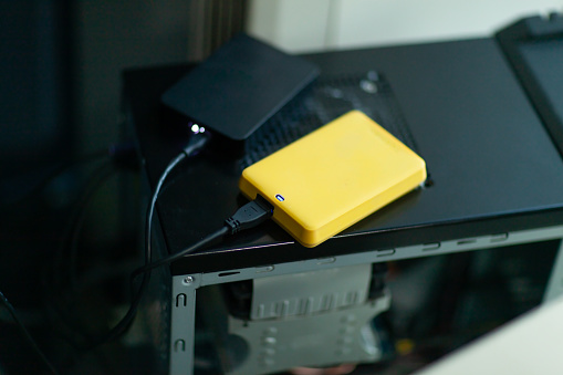 An external hard drive backup device connected to the computer