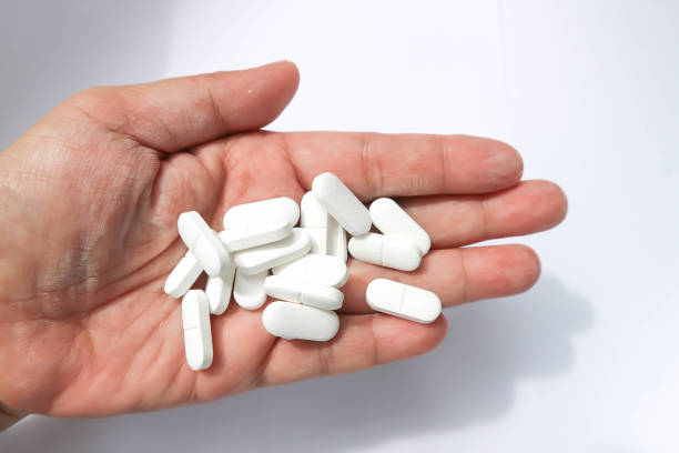 istock pharmaceutical or medicine or pills, tablets and capsules 1409045110