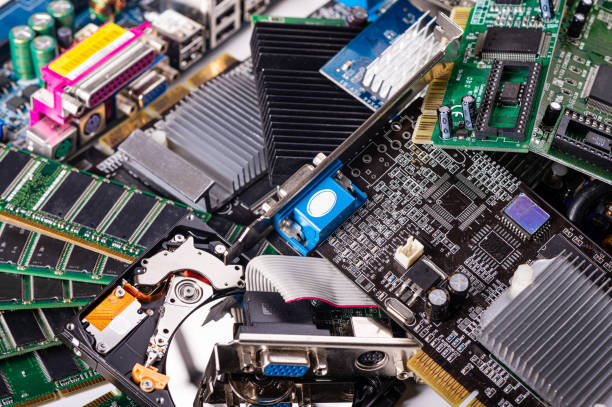 istock pile with various computer electrical boards and components, Repairing and upgrade concept, closeup 1409052055