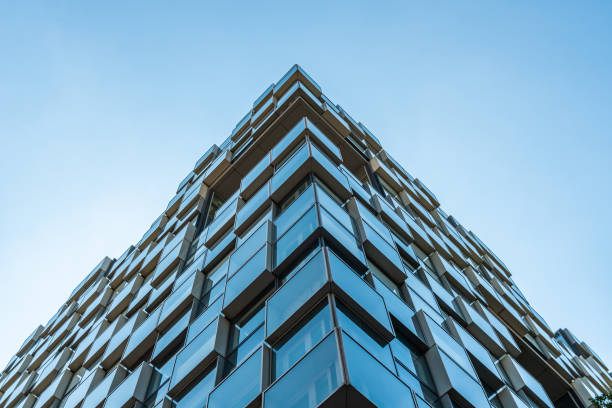 istock Skyscraper glass facades on the blue sky background 1409057114