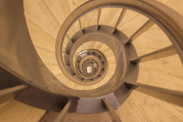 istock selective focus on the base of spiral staircase 1409060808