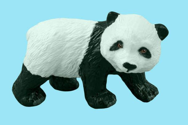 Panda toy on blue background Panda toy on blue background bär stock pictures, royalty-free photos & images