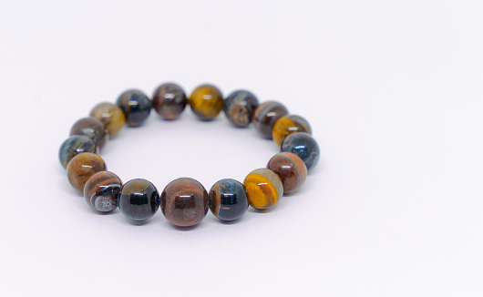 A tiger's eye stone bracelet is worn to protect and enhance your fortune.