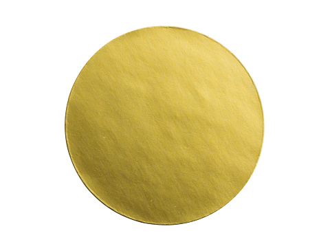 Papel adhesivo redondo dorado en blanco etiqueta adhesiva metálica aislada sobre fondo blanco photo