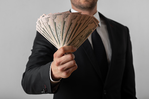 Businessman holding money