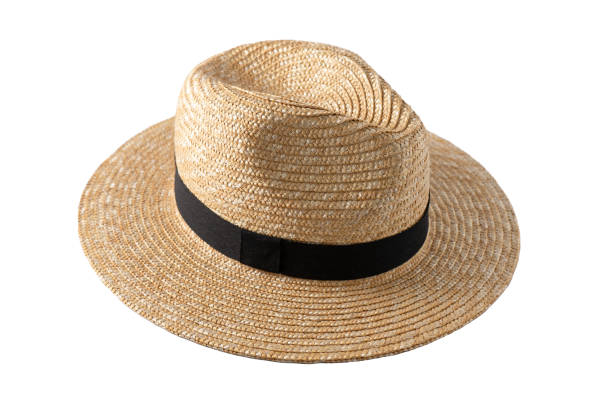 istock Straw fedora hat isolated. Summer hat with black ribbon. Cap on white background. 1409082723
