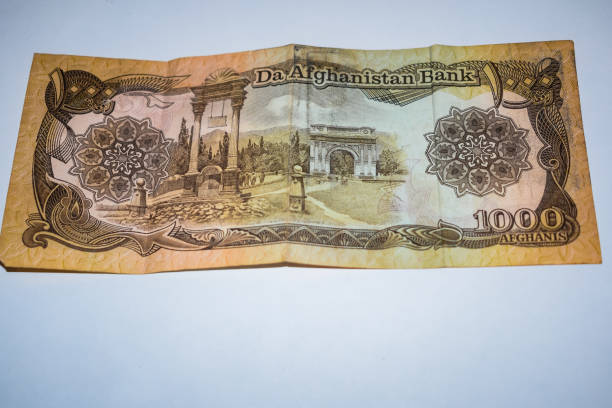 istock Rare Old One thousand afgans Foreign Currency Note, Afganistan Old Foreign Currency Note, Very old currency with white background 1409083783