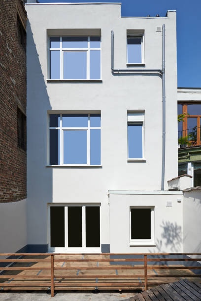 istock Building facade repair and insulation before and after 1409083863