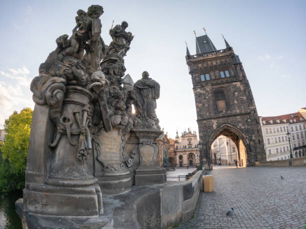 View from Charles bridge in Mala Strana quarter. Prague, Czech Republic\nSunrise time, empty streets.