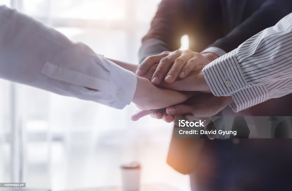 Business handshake for teamwork of business merger and acquisition,successful negotiate,hand shake, businessman shake hand with partner to celebration partnership and business deal concept Lawyer Stock Photo