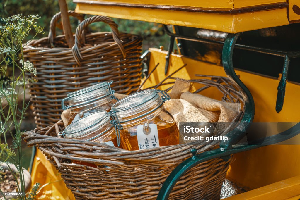 Jars of honey in the countryside in Denmark Beauty Stock Photo