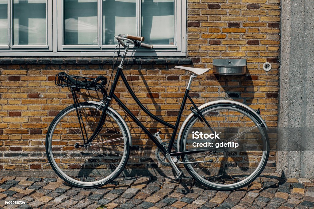 A bike in Copenhangen during a sunny summer day Activity Stock Photo