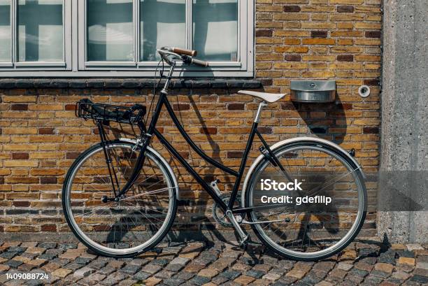 A Bike In Copenhangen During A Sunny Summer Day Stock Photo - Download Image Now - Activity, Alley, Architecture