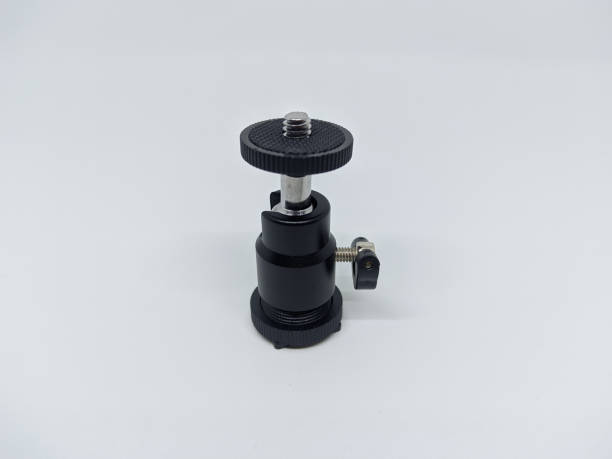 istock Photo video camera ball head isolated on white background. 1409090124