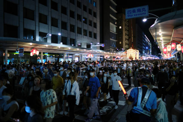 Crowds fill Shijo Street during the Gion Festival stock photo