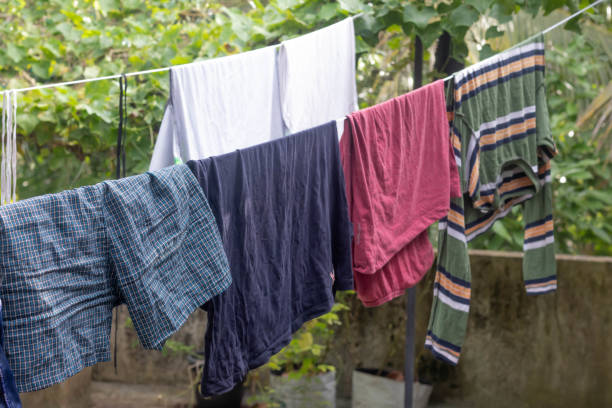 istock Wet cloth on hanger to dry in sunlight 1409099795