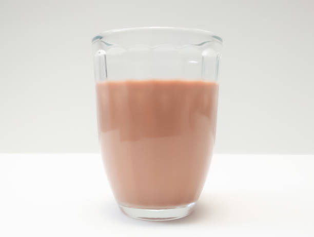 istock glass of chocolate milk. Dairy drink 1409103499