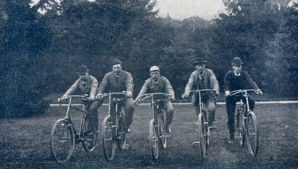 istock Royal bicyclists in a row on a meadow, princes from Russia, Denmark and Greece 1409120681