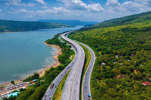 Aerial view of highway near the lake.