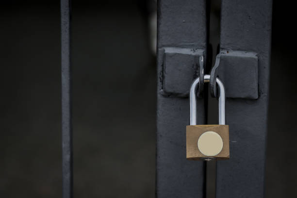 istock Wire fence door with lock. 1409125485