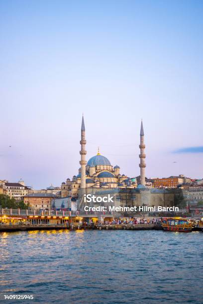 Yeni Cami Mosque And Galata Bridge At Sunset Istanbul Turkey Stock Photo - Download Image Now