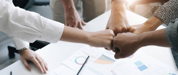 istock Panoramic teamwork business join hand together concept, Business team standing hands together, Volunteer charity work. People joining for cooperation success business. 1409126091