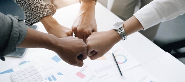 istock Panoramic teamwork business join hand together concept, Business team standing hands together, Volunteer charity work. People joining for cooperation success business. 1409126113