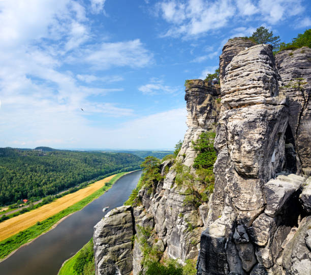 Panoramic view of the Elbsandstein Mountains and Elbe river in Saxon Switzerland, Germany. Composite photo