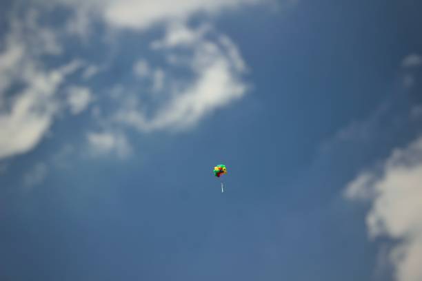 colorful helium balloons flying in the blue sky in Indonesia
